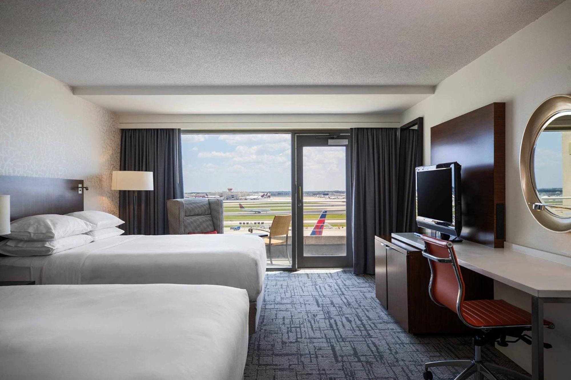 Runway View Guest room 2 Queen Balcony,1632242022:JPEG
